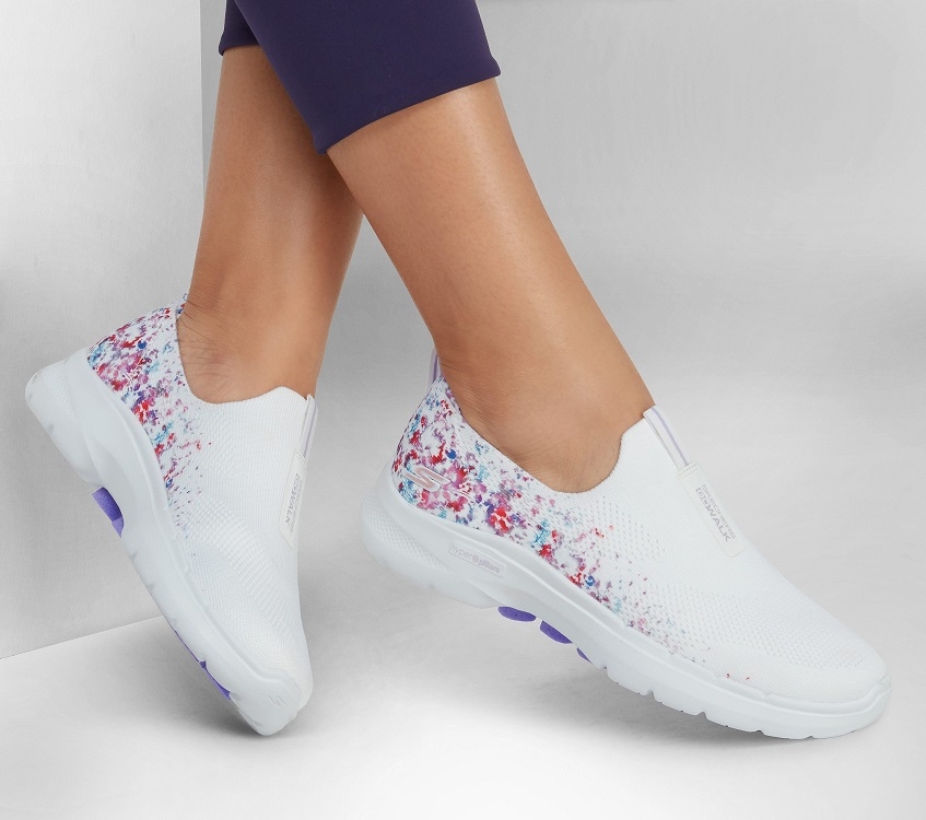 pink skechers with flowers